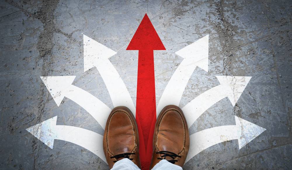 Pros & Cons of Temp Jobs vs. Permanent Jobs: Finding the Right Fit for Your Career 1 brown leather shoes many chalky arrows asphalt decision concept scaled
