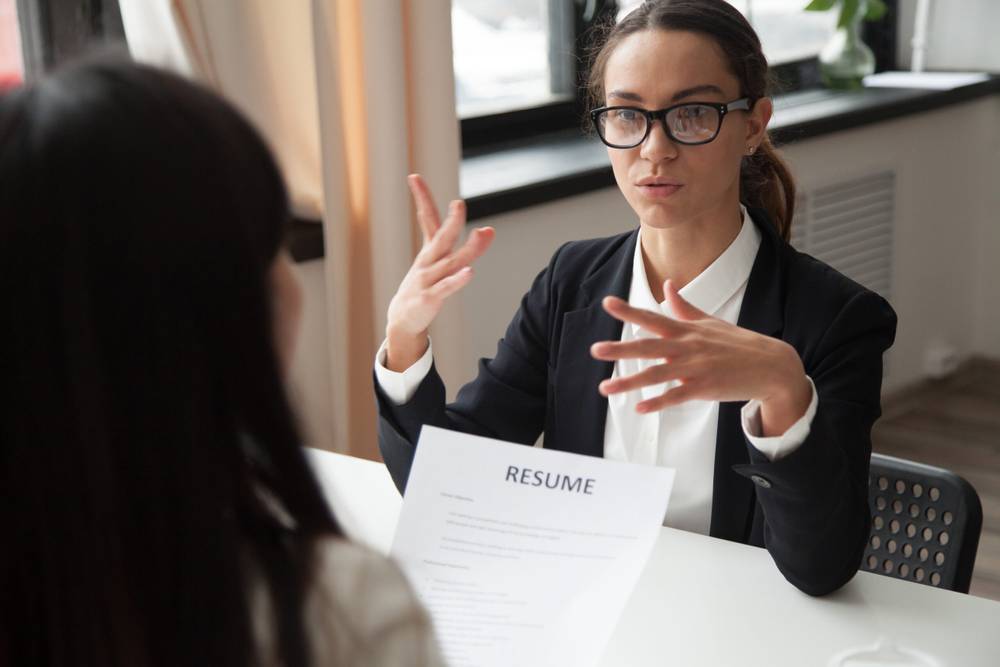 Top 10 Skills Your Resume Can Benefit From 2 confident millennial female applicant glasses talking job interview scaled